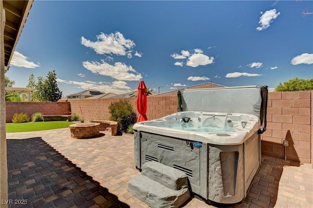 2902 Ventana Ridge Ave, Henderson, NV 89044 - view of patio / terrace with a hot tub and a fenced backyard