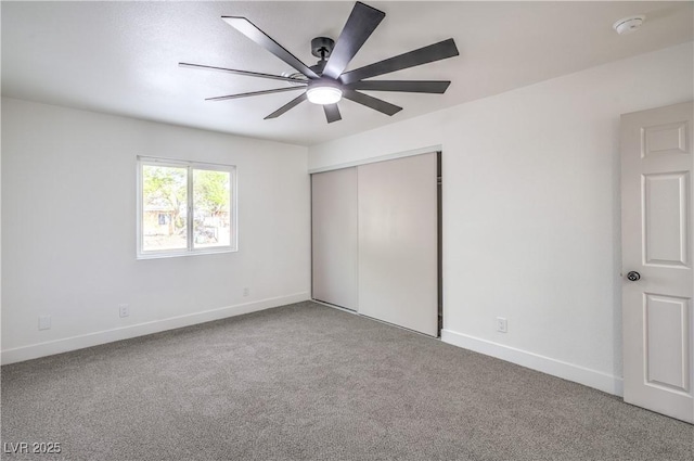 5239 Elgin Cir, Las Vegas, NV 89122 - unfurnished bedroom with carpet floors, baseboards, a closet, and ceiling fan