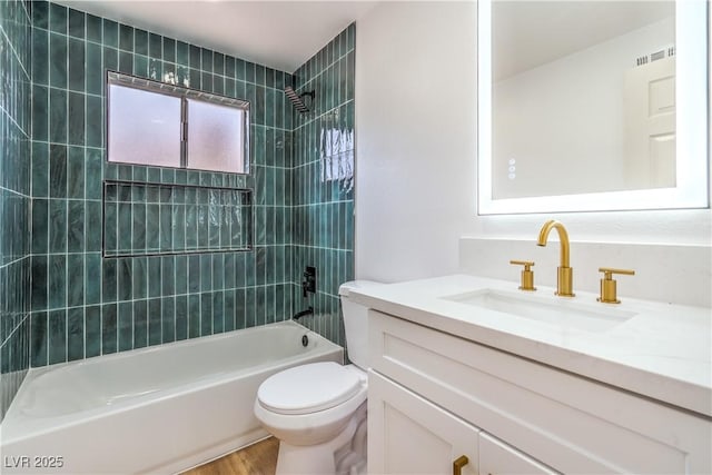 5239 Elgin Cir, Las Vegas, NV 89122 - bathroom featuring shower / bathtub combination, toilet, vanity, and wood finished floors