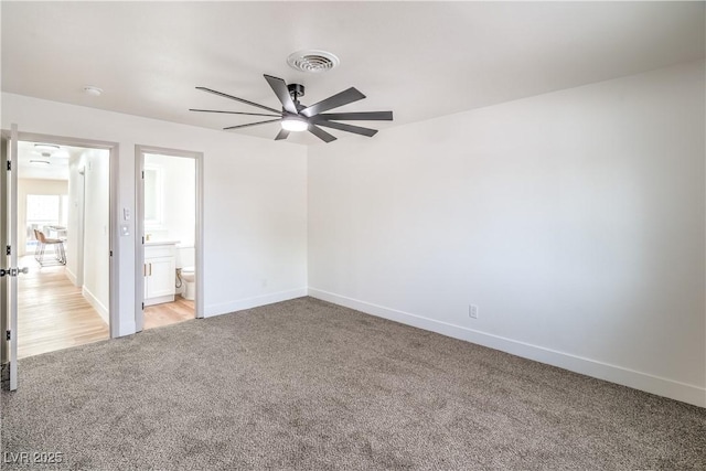 5239 Elgin Cir, Las Vegas, NV 89122 - empty room with light colored carpet, ceiling fan, and baseboards
