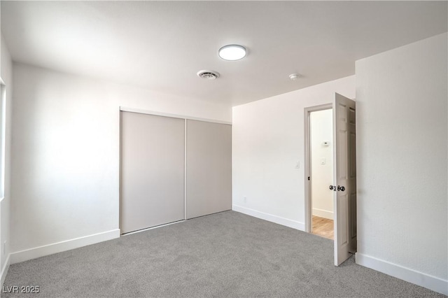 5239 Elgin Cir, Las Vegas, NV 89122 - unfurnished bedroom featuring carpet floors, a closet, and baseboards