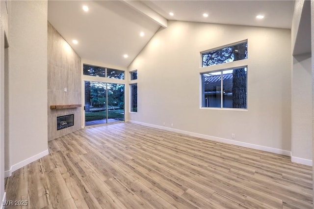 5010 Crooked Stick Way, Las Vegas, NV 89113 - unfurnished living room featuring high vaulted ceiling, light wood-style flooring, beamed ceiling, baseboards, and recessed lighting