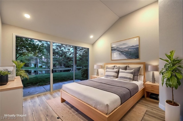 5010 Crooked Stick Way, Las Vegas, NV 89113 - bedroom featuring access to exterior, vaulted ceiling, light wood-style flooring, and recessed lighting