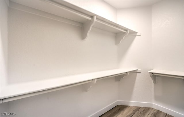 5010 Crooked Stick Way, Las Vegas, NV 89113 - walk in closet featuring light wood-type flooring