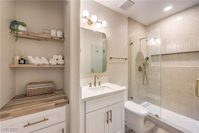 5010 Crooked Stick Way, Las Vegas, NV 89113 - bathroom featuring a shower stall, toilet, and vanity