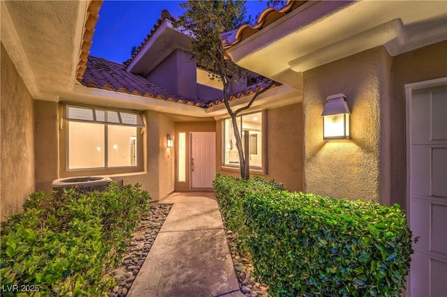 5010 Crooked Stick Way, Las Vegas, NV 89113 - entrance to property with a tiled roof and stucco siding