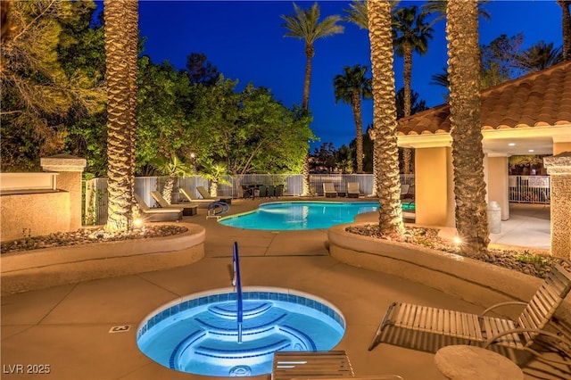 5010 Crooked Stick Way, Las Vegas, NV 89113 - pool at twilight with a community pool, a patio area, and fence