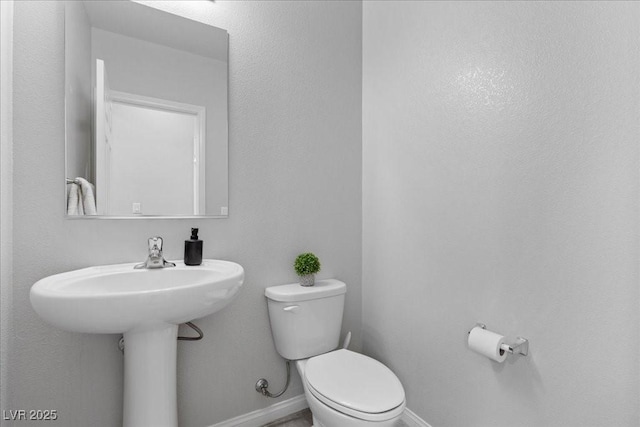 2276 Sky Island Dr, Henderson, NV 89002 - half bath with toilet and baseboards