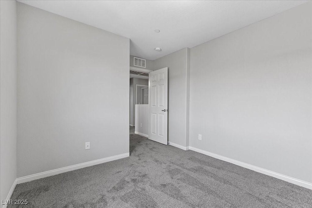 2276 Sky Island Dr, Henderson, NV 89002 - unfurnished bedroom featuring carpet floors and baseboards