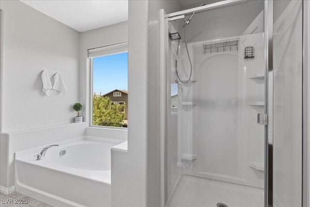 2276 Sky Island Dr, Henderson, NV 89002 - bathroom featuring a shower stall and a bath