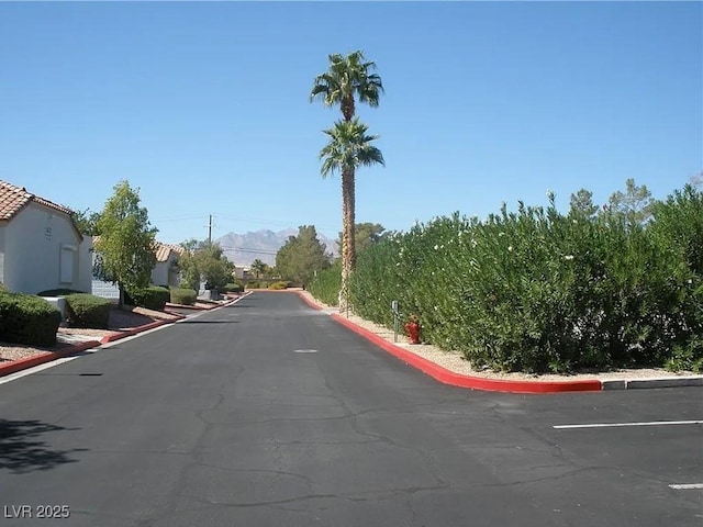 5400 Tassara Way Unit 106, Las Vegas, NV 89108 - view of asphalt street with curbs
