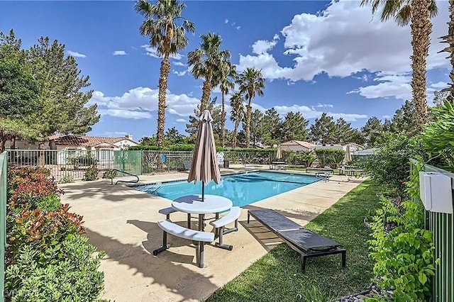 5400 Tassara Way Unit 106, Las Vegas, NV 89108 - community pool with fence and a patio area