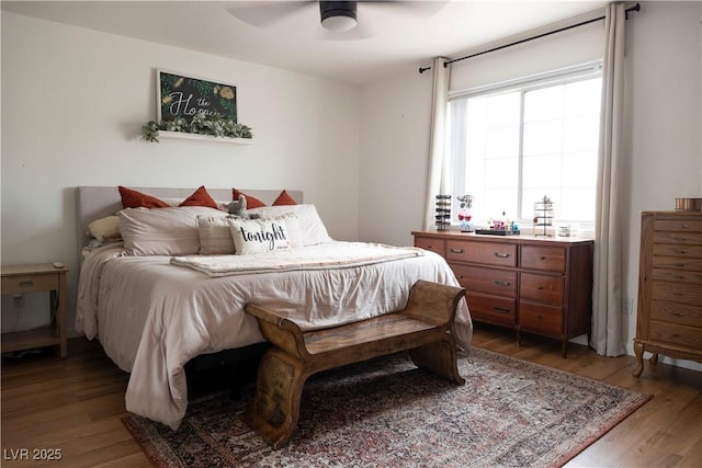 5400 Tassara Way Unit 106, Las Vegas, NV 89108 - bedroom with wood finished floors and a ceiling fan
