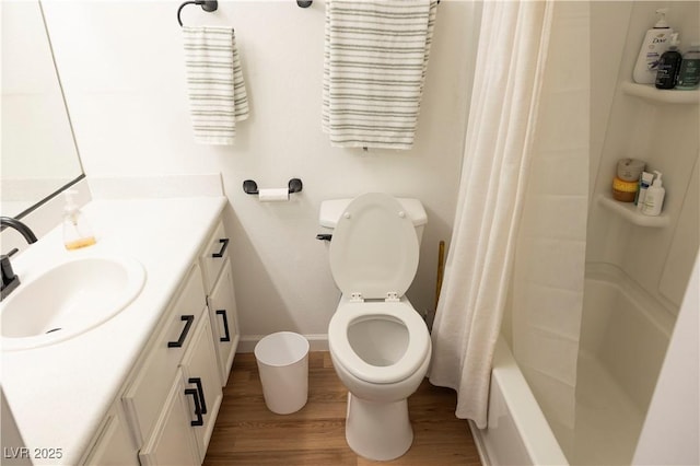 5400 Tassara Way Unit 106, Las Vegas, NV 89108 - full bathroom featuring wood finished floors, vanity, toilet, and baseboards
