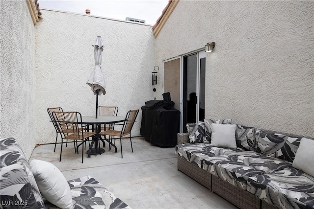 5400 Tassara Way Unit 106, Las Vegas, NV 89108 - view of patio featuring outdoor dining area