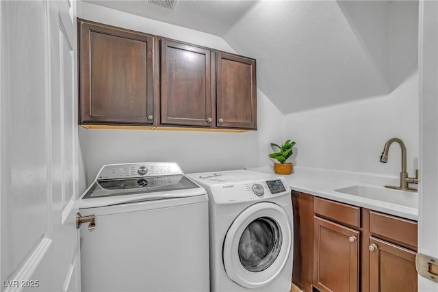 153 Via Di Mello, Henderson, NV 89011 - laundry room featuring cabinet space and washer and clothes dryer