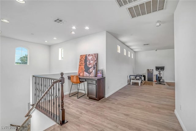 153 Via Di Mello, Henderson, NV 89011 - hallway with an upstairs landing, baseboards, light wood-type flooring, and recessed lighting