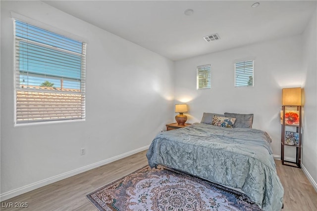 153 Via Di Mello, Henderson, NV 89011 - bedroom with wood finished floors and baseboards
