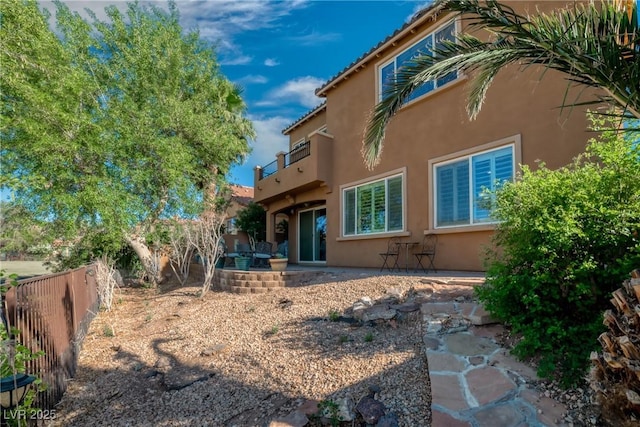 153 Via Di Mello, Henderson, NV 89011 - rear view of property with stucco siding and a patio