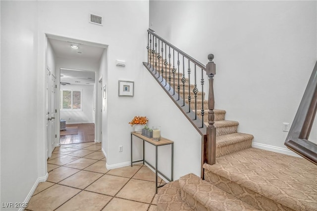 153 Via Di Mello, Henderson, NV 89011 - stairs with tile patterned flooring and baseboards