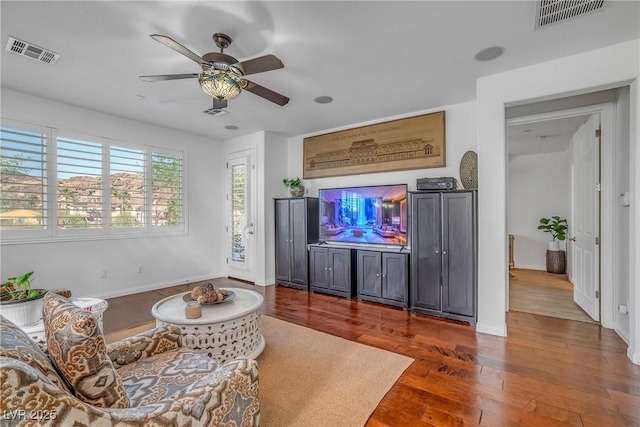 153 Via Di Mello, Henderson, NV 89011 - living room with ceiling fan, wood finished floors, and baseboards