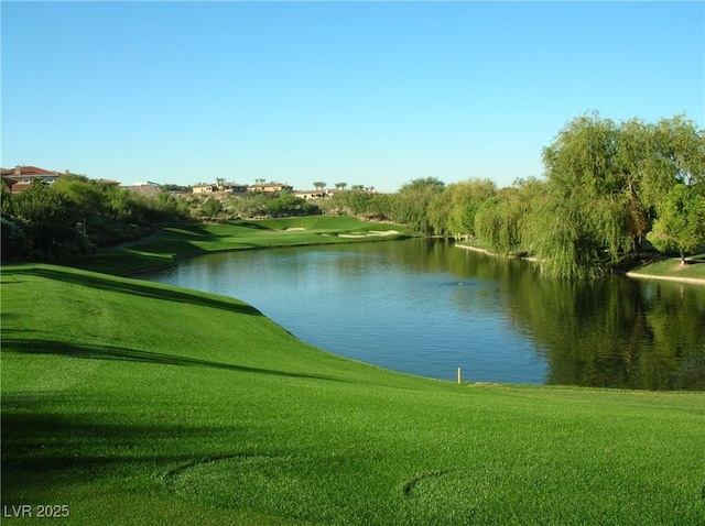153 Via Di Mello, Henderson, NV 89011 - view of property's community with a water view, view of golf course, and a lawn