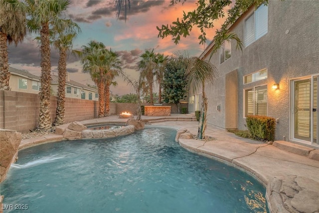 11158 Antonine Wall Ct, Las Vegas, NV 89141 - view of swimming pool with fence, a pool with connected hot tub, and a patio area