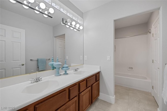 11158 Antonine Wall Ct, Las Vegas, NV 89141 - full bathroom featuring double vanity, shower / bath combination, tile patterned floors, and baseboards
