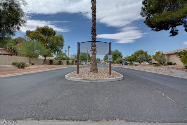 227 N Lamb Blvd Unit B, Las Vegas, NV 89110 - view of asphalt road featuring sidewalks and curbs