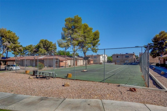 227 N Lamb Blvd Unit B, Las Vegas, NV 89110 - view of tennis court featuring fence and a residential view