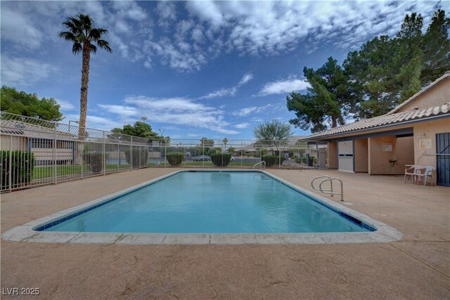 227 N Lamb Blvd Unit B, Las Vegas, NV 89110 - community pool with a patio area and fence