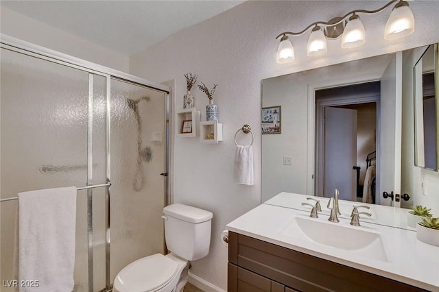 227 N Lamb Blvd Unit B, Las Vegas, NV 89110 - full bath featuring a stall shower, toilet, vanity, and baseboards