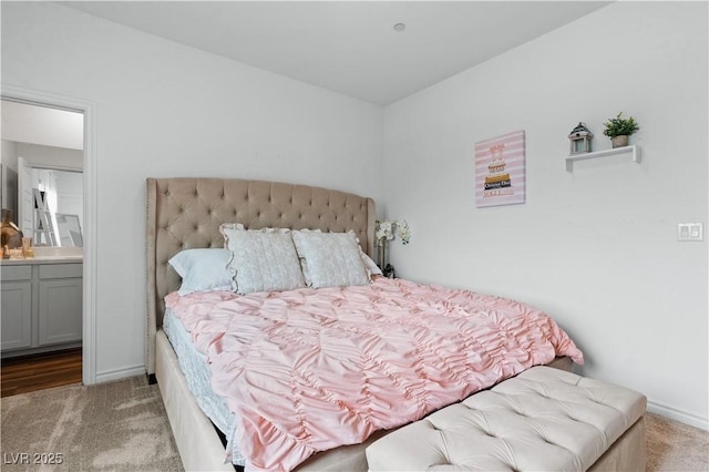 3729 Canis Minor Ln Unit 10206, Henderson, NV 89052 - bedroom featuring carpet flooring, baseboards, and ensuite bath