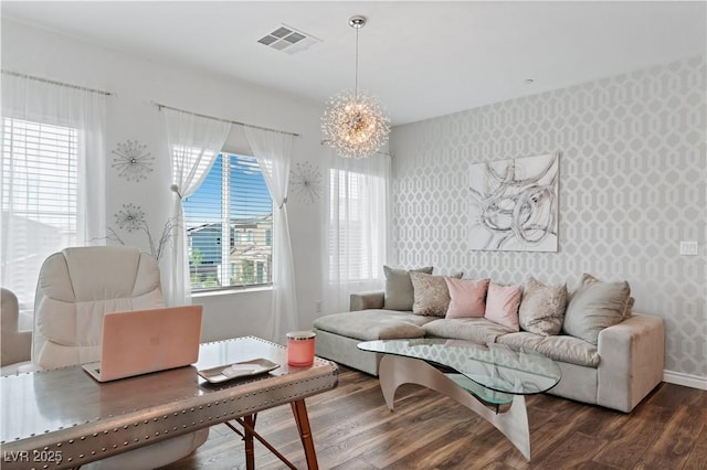 3729 Canis Minor Ln Unit 10206, Henderson, NV 89052 - living area with wallpapered walls, a chandelier, wood finished floors, and baseboards