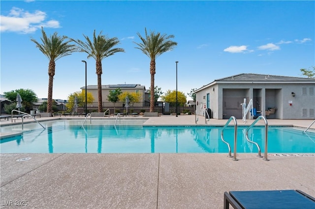 3729 Canis Minor Ln Unit 10206, Henderson, NV 89052 - community pool featuring fence and a patio
