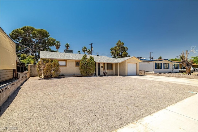 5817 Glen Eagles Ln, Las Vegas, NV 89108 - single story home featuring concrete driveway, an attached garage, and stucco siding