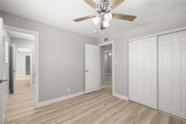 5817 Glen Eagles Ln, Las Vegas, NV 89108 - unfurnished bedroom featuring light wood-style floors, a closet, baseboards, and a ceiling fan