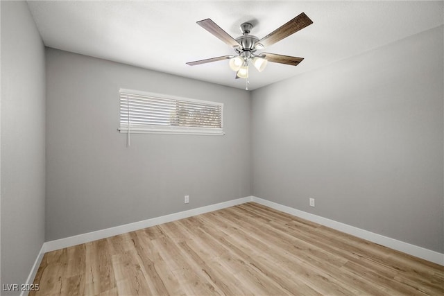 5817 Glen Eagles Ln, Las Vegas, NV 89108 - unfurnished room featuring baseboards, light wood finished floors, and a ceiling fan