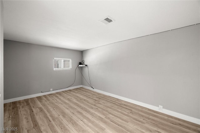 5817 Glen Eagles Ln, Las Vegas, NV 89108 - unfurnished room featuring light wood finished floors and baseboards