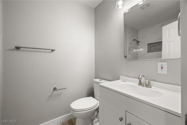 5817 Glen Eagles Ln, Las Vegas, NV 89108 - full bathroom featuring vanity, toilet, baseboards, and a shower