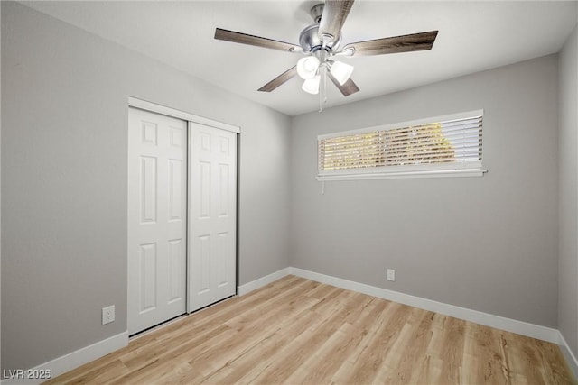5817 Glen Eagles Ln, Las Vegas, NV 89108 - unfurnished bedroom with a closet, baseboards, light wood-type flooring, and ceiling fan