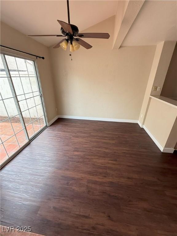 7969 Cina Ave, Las Vegas, NV 89147 - spare room featuring a ceiling fan, dark wood-style flooring, baseboards, and lofted ceiling