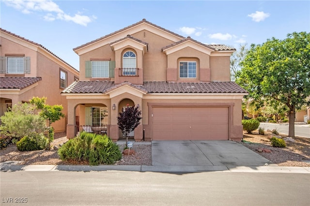 7641 Lani Dawn St, Las Vegas, NV 89149 - mediterranean / spanish-style house featuring an attached garage, stucco siding, and concrete driveway