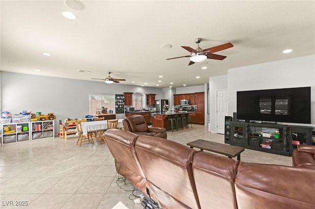7641 Lani Dawn St, Las Vegas, NV 89149 - living area featuring ceiling fan, recessed lighting, and light tile patterned floors