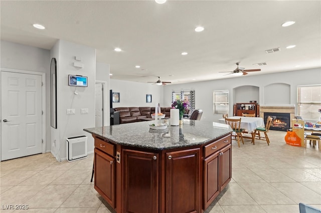 7641 Lani Dawn St, Las Vegas, NV 89149 - kitchen featuring open floor plan, a ceiling fan, light tile patterned floors, and recessed lighting