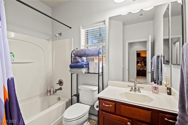7641 Lani Dawn St, Las Vegas, NV 89149 - bathroom with shower / bathtub combination with curtain, vanity, and toilet