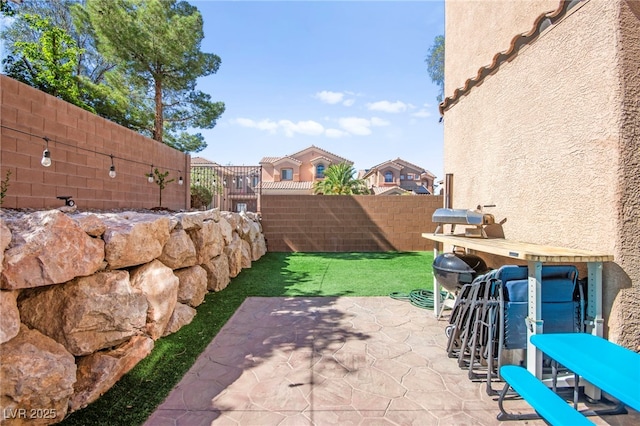 7641 Lani Dawn St, Las Vegas, NV 89149 - view of patio / terrace with a fenced backyard