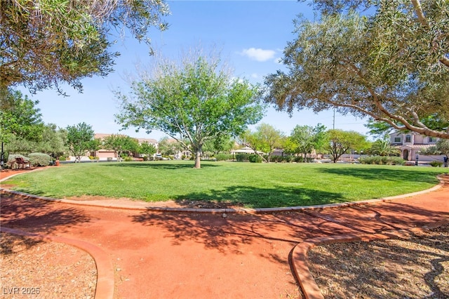 7641 Lani Dawn St, Las Vegas, NV 89149 - view of home's community featuring a yard