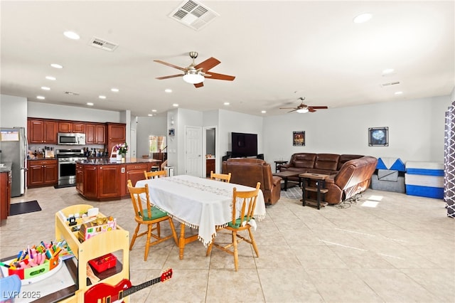 7641 Lani Dawn St, Las Vegas, NV 89149 - dining space with recessed lighting, a ceiling fan, and light tile patterned flooring
