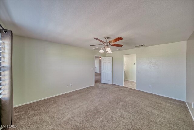 5460 Chippewa, Pahrump, NV 89061 - unfurnished bedroom with carpet floors, baseboards, a ceiling fan, and a textured ceiling